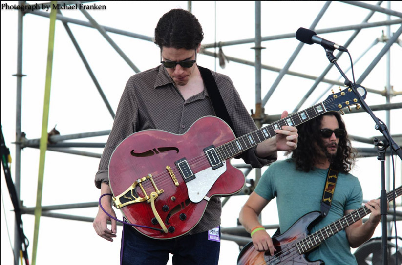 Conrad Oberg playing guitar with his band atat Camden Backyard BBQ 2013